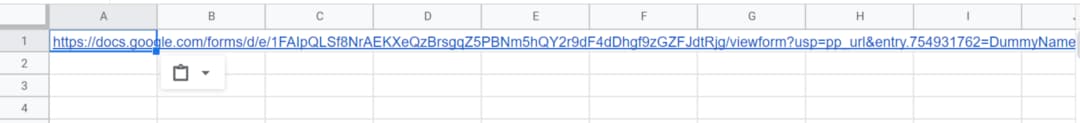A pre-filled Google Forms URL pasted into cell A1 of a spreadsheet.