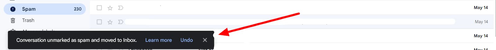 Gmail confirmation that a conversation was unmarked as spam and moved to the inbox.