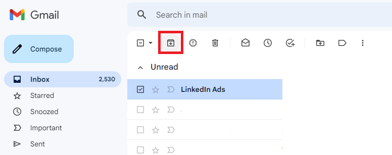Gmail archive button highlighted for a selected unread message.