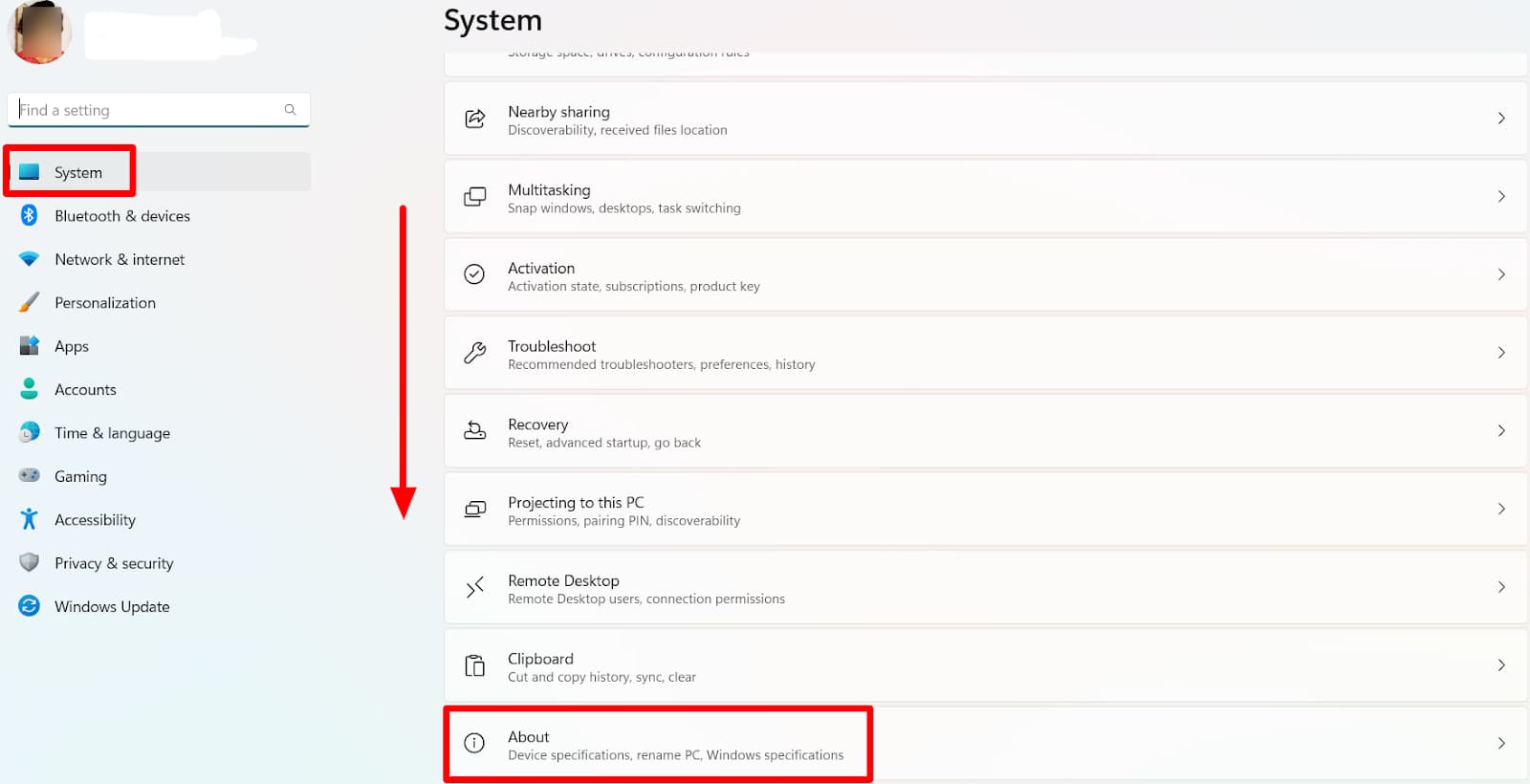 Windows System settings with the About section highlighted.